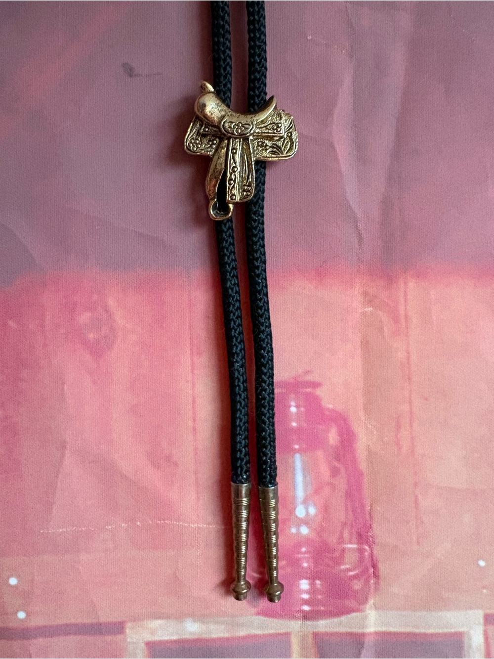 Vintage Western Saddle Bolo Tie – Gold Tone Slide, Black Braided Cord